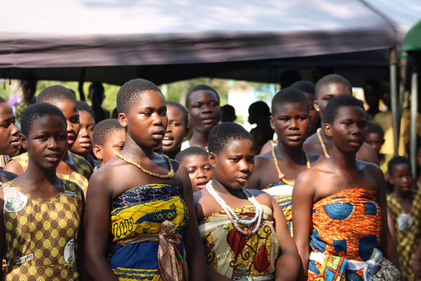 Young women in traditional cloth at a celebration