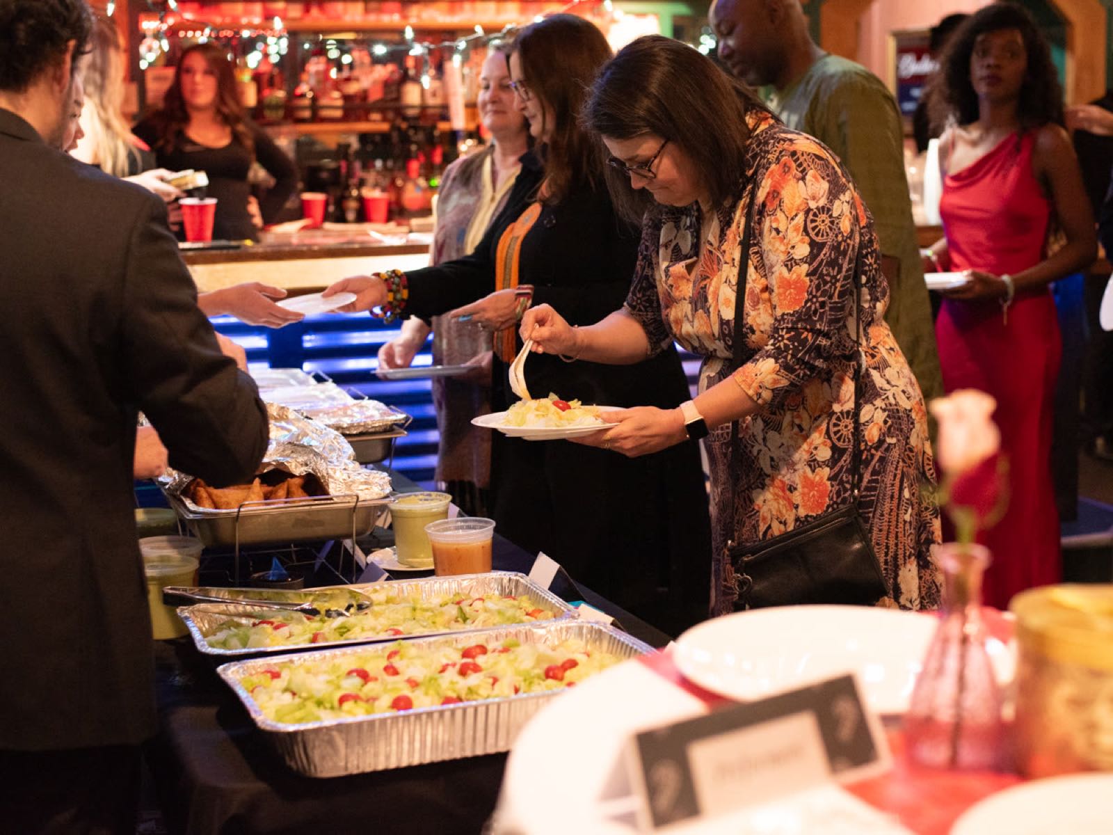 Guests serving themselves at the buffet
