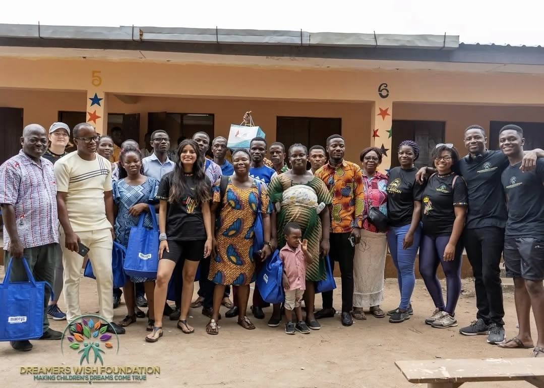 Mama Josephine with teachers, volunteers and community members at Dadome DA Basic School