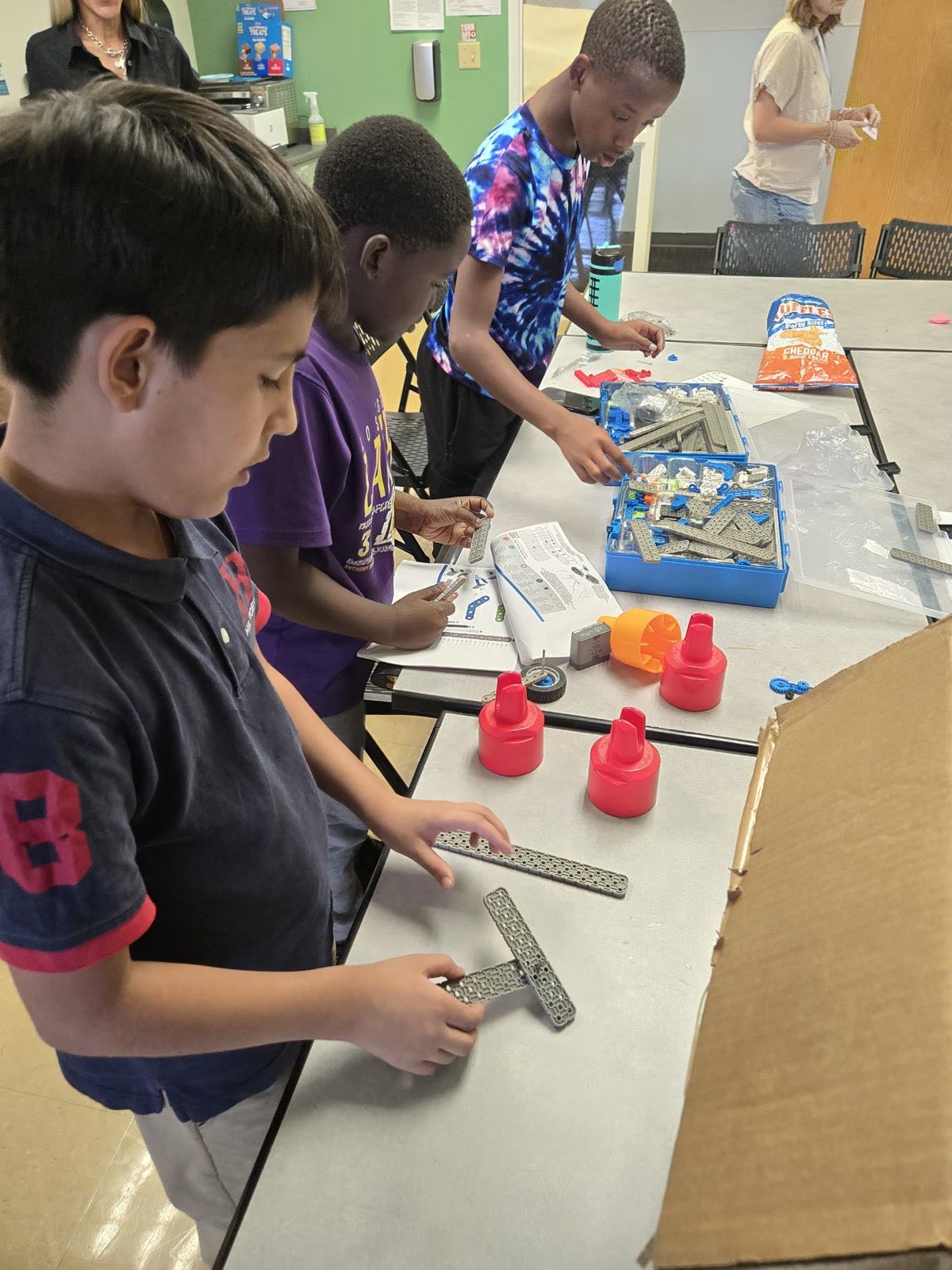 Students building their robots together