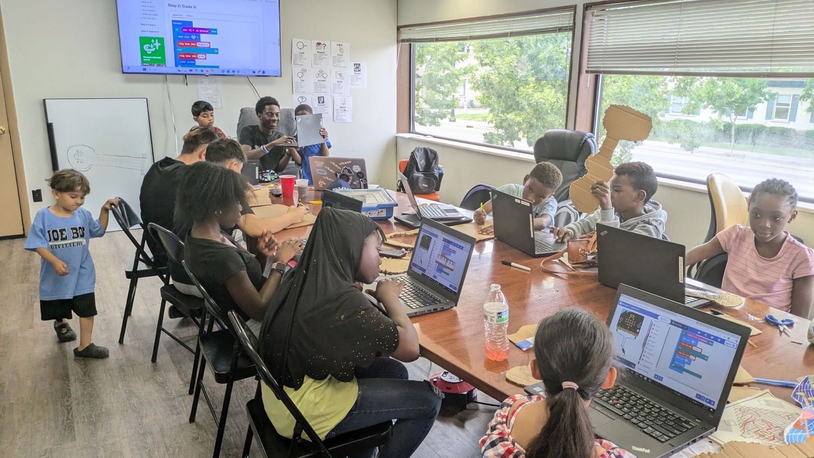 Students and mentors in a Utah robotics class